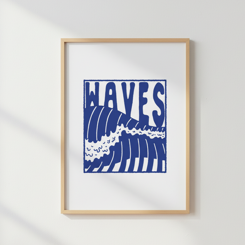 Framed artwork with 'WAVES' text and wave design on a white wall above a desk.